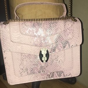 NWOT,silver on pink snake print satchel bag.